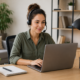 Remote customer support professional assisting customers through laptop and headset while working from a home office